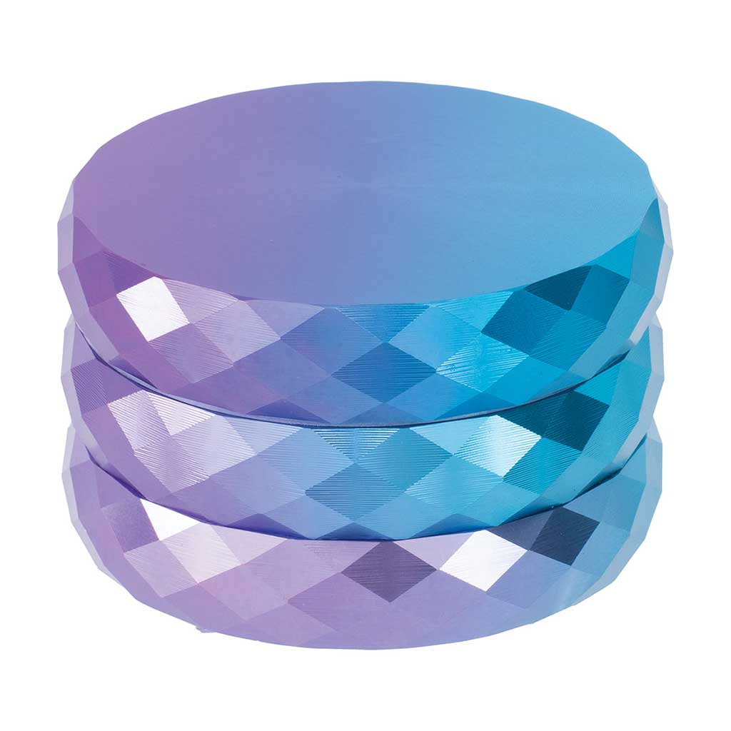 Premium 4-piece metal herb grinder on slate